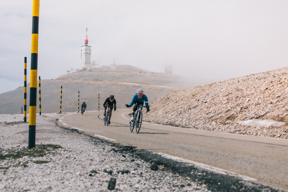 Cyclists climbing Mont Ventoux in the fog